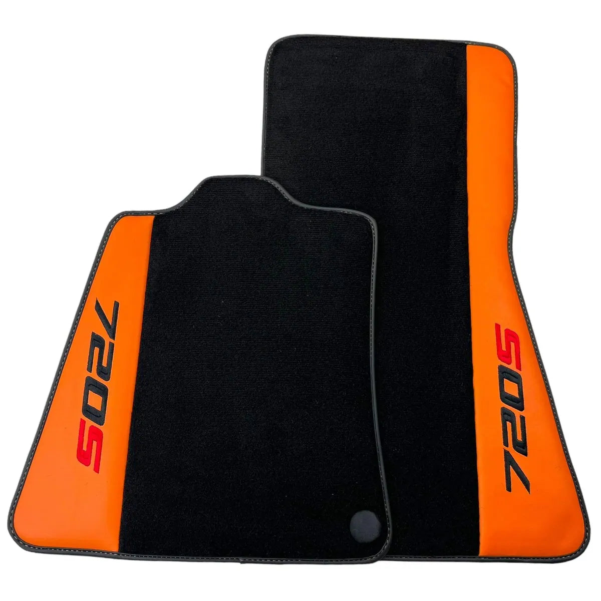 Black McLaren 720S floor mats with orange leather sides